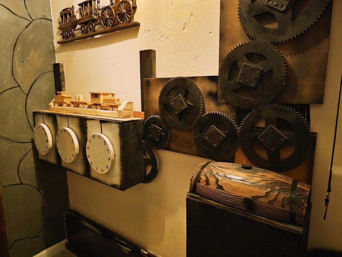 a stove top oven sitting inside of a kitchen